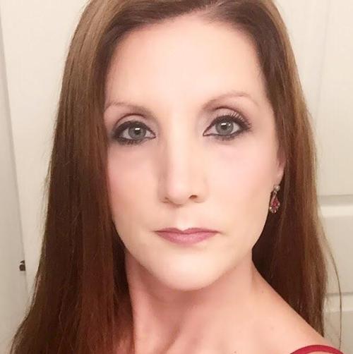 Kimberly E.