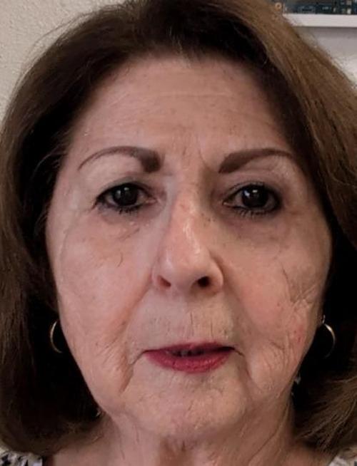 MARTHA M.