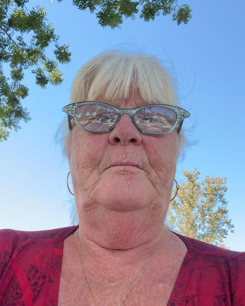 RHONDA E.