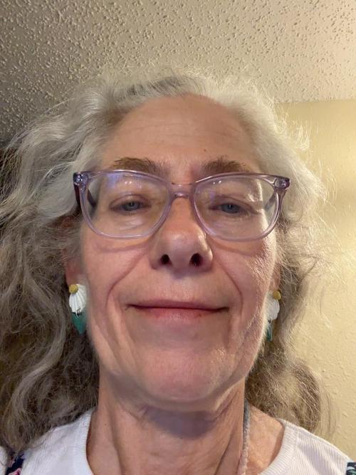 SHARI DAWN P.